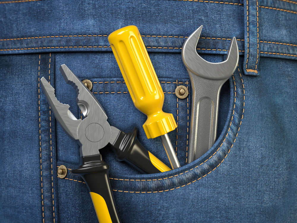 tools-in-jeans-pocket-service-and-engineering-conc-DXPE22J-3.jpg