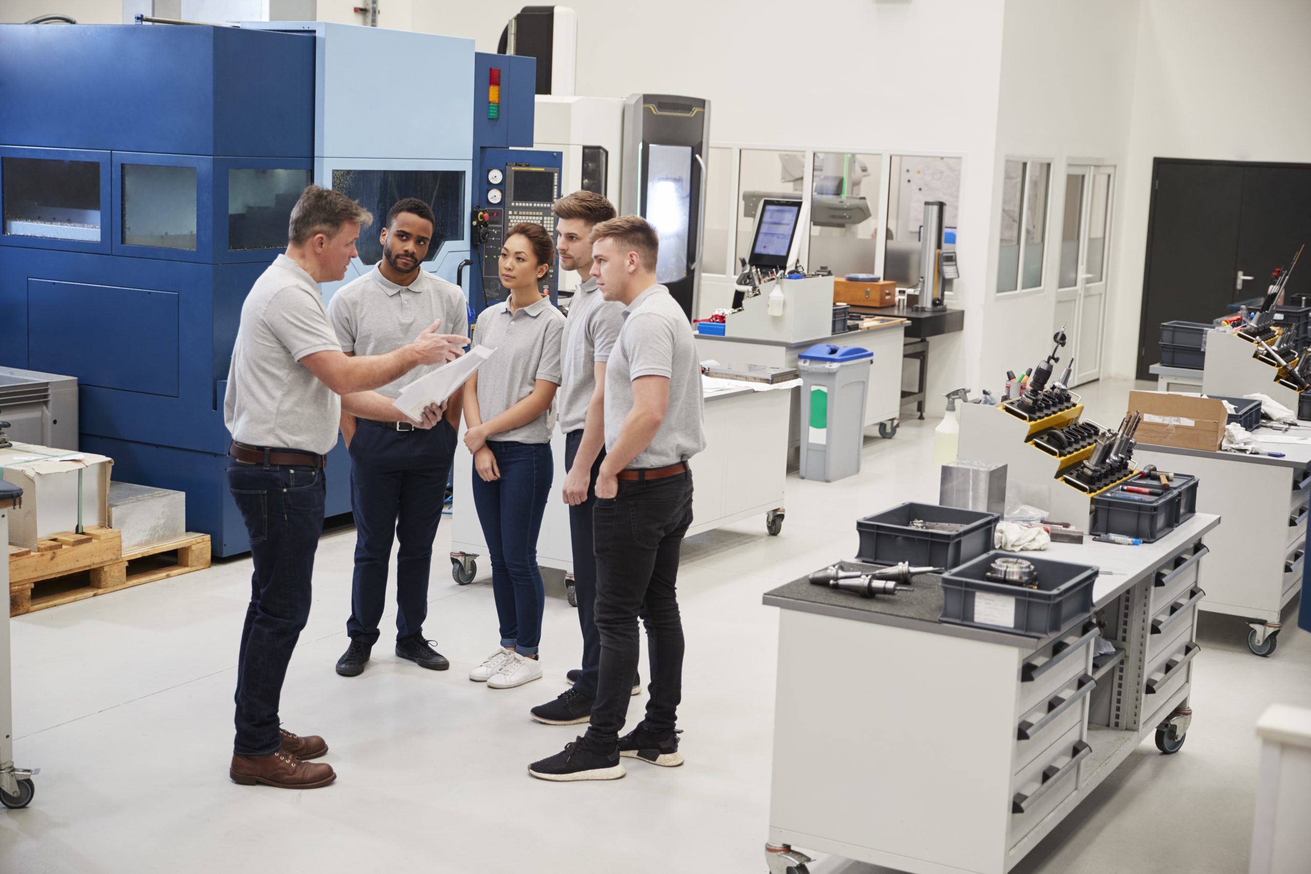 engineering-team-meeting-on-factory-floor-of-busy-37EK6PJ-scaled-1.jpg engineering-team-meeting-on-factory-floor-of-busy-37EK6PJ-scaled-1.jpg