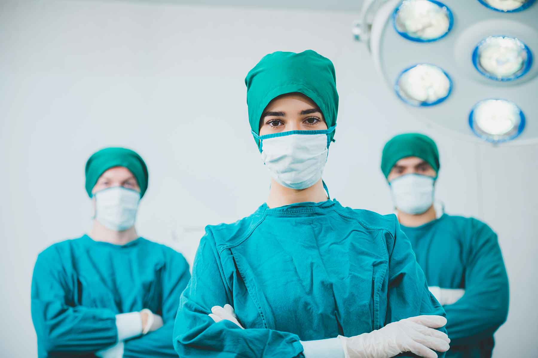 portrait-of-male-and-female-surgeon-doctors-wearin-MTBD3CF.jpg